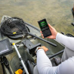 Power Trip: The Latest Lithium Batteries For Your Kayak Build man uses a Norsk lithium ion battery with his kayak with integrated phone app