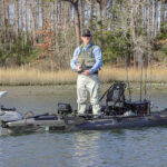 Gear Of The Year 2026: Largemouth Bass Kayak Angler editor Ric Burnley stands and fishes for largemouth bass from a kayak