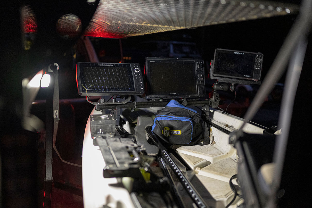 a fully rigged fishing kayak with dual fish finders in a trailer