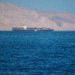 Kayak Manufacturing Costs Spike As Strait of Hormuz Remains Closed Tanker ship on ocean