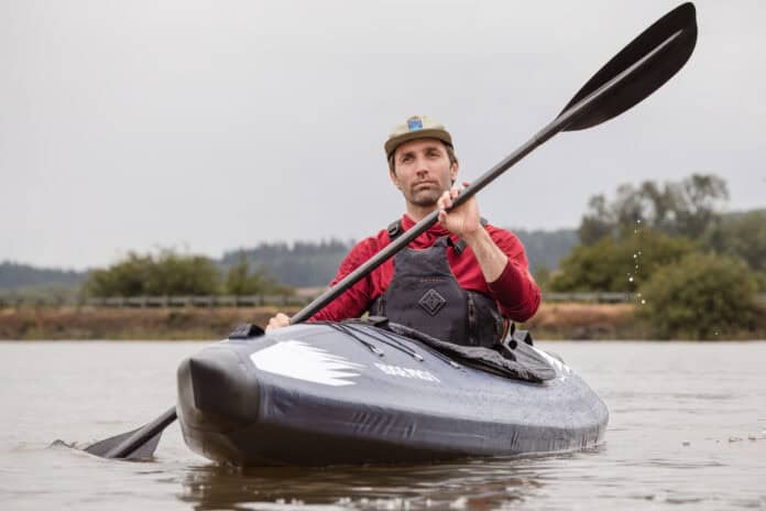 Editor Joe Potoczak paddling the Razor Edge Pro inflatable kayak.