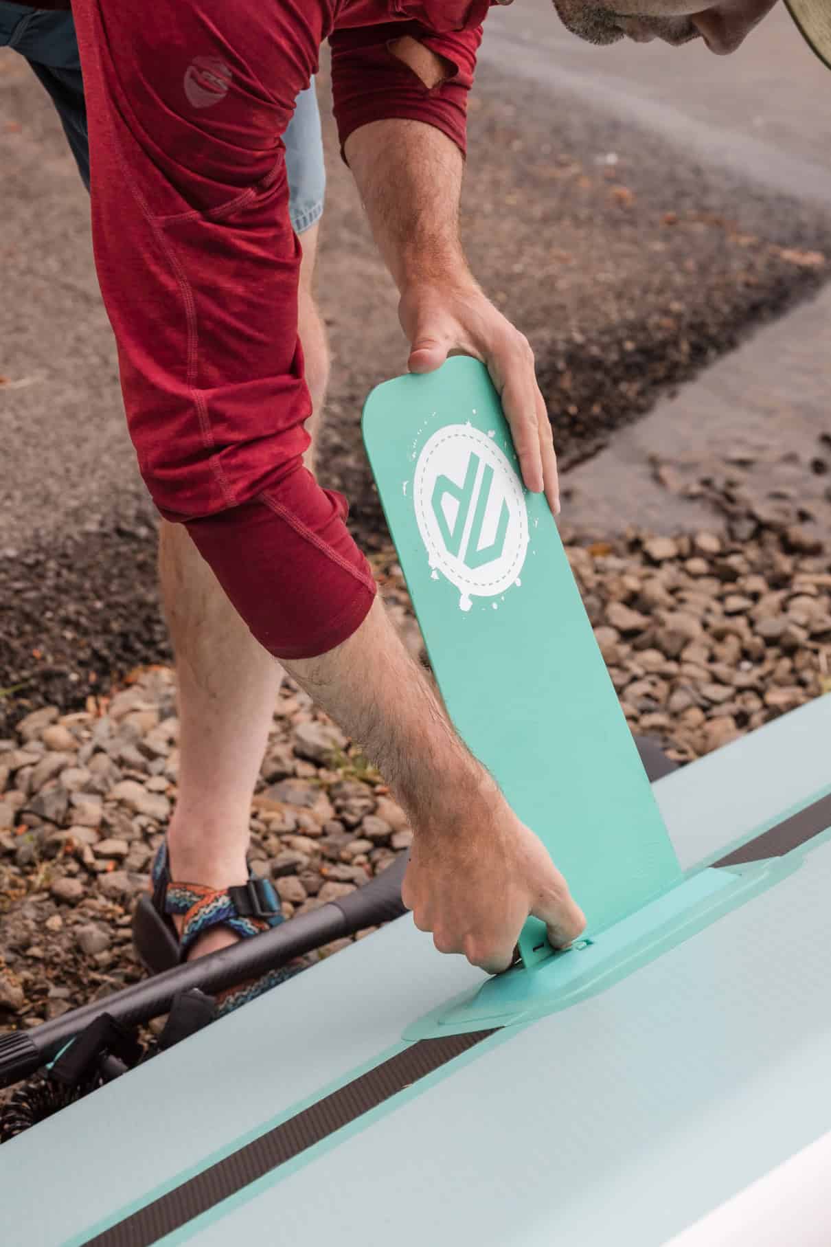 Inserting the StabilTrac fin system.