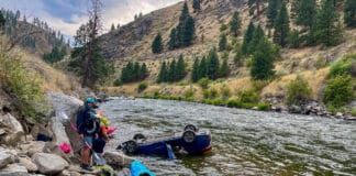 Behind The Rescue: Kayakers Save Family After Car Plunges Into River Boaters jumped into action to rescue two occupants when this vehicle flew off-road into the North Fork Payette River