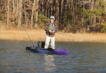 Kayak Review: Vibe Shaka 100 Kayak Angler editor Ric Burnley stands and fishes from the Vibe Shaka 100 sit-inside kayak