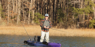 Kayak Review: Vibe Shaka 100 Kayak Angler editor Ric Burnley stands and fishes from the Vibe Shaka 100 sit-inside kayak