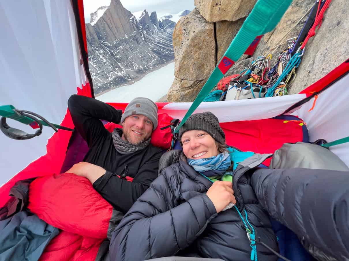 Erik Boomer and Sarah McNair-Landry lying in portaledge