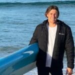 Paddleboarder Saves Woman Critically Injured In Shark Attack man with paddleboard