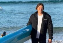 Paddleboarder Saves Woman Critically Injured In Shark Attack man with paddleboard