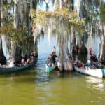 Have Kids, Will Paddle: Nikki Bettis Is Rebuilding Her Family One Expedition At A Time Nikki Bettis (back left) with her flotilla during the Mississippi River expedition