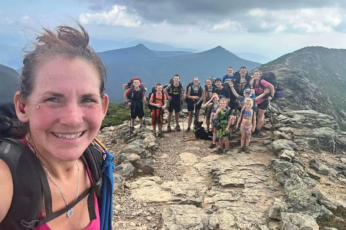 Nikki Bettis and kids pose on the Appalachian Trail