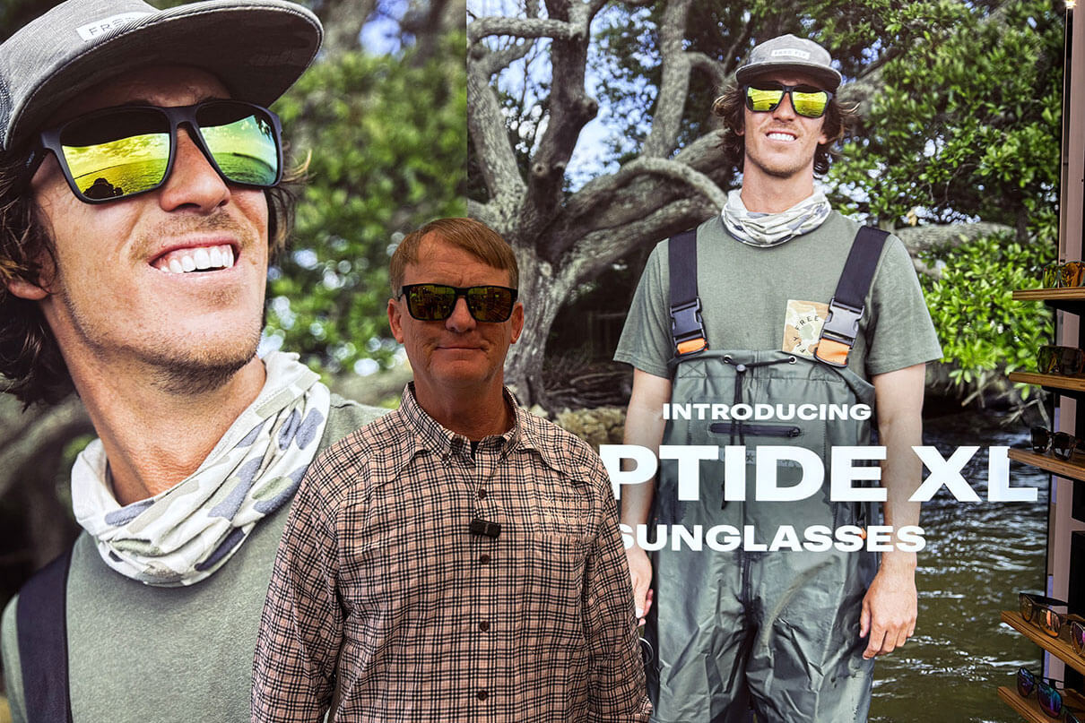Kayak Angler editor Ric Burnley models a pair of Smith Optics Riptide XL in front of their billboard at ICAST 2026