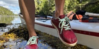 Best Water Shoes For 2026 astral brewer water shoes on a kayak trip