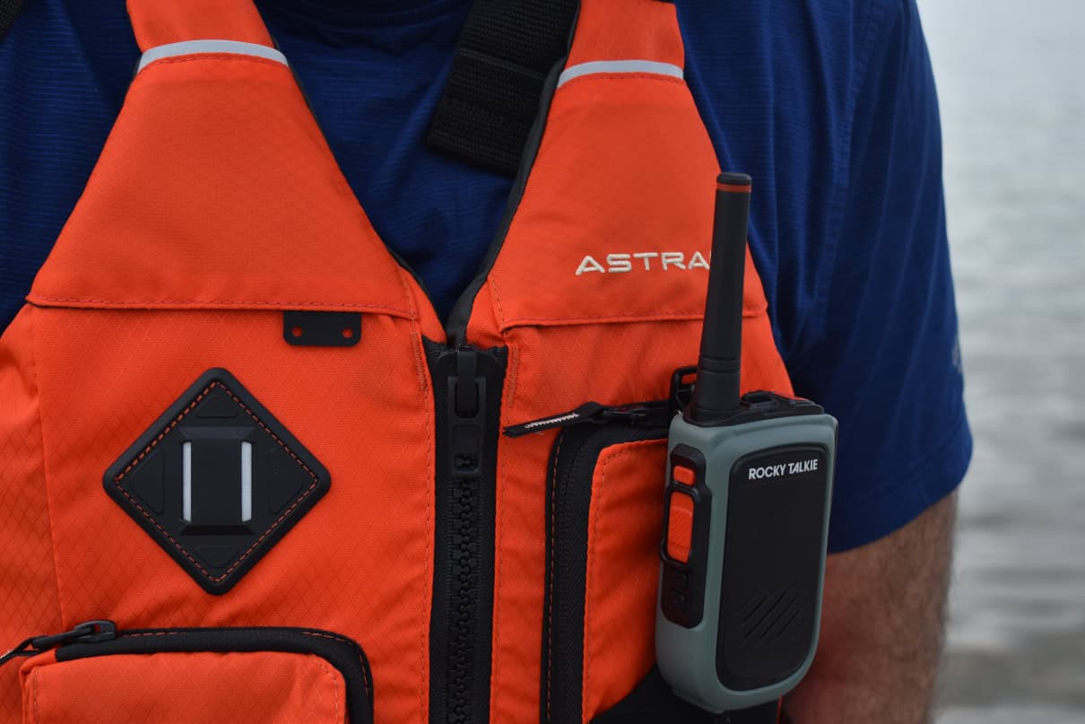 A Rocky Talkie Expedition Radio attached to a PFD.