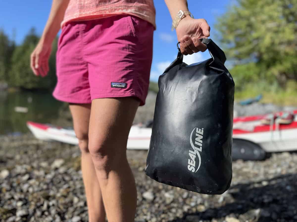 woman carrying dry bag 