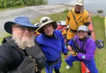 Jeff Johnson poses with fellow paddlers during their Lake Superior trip