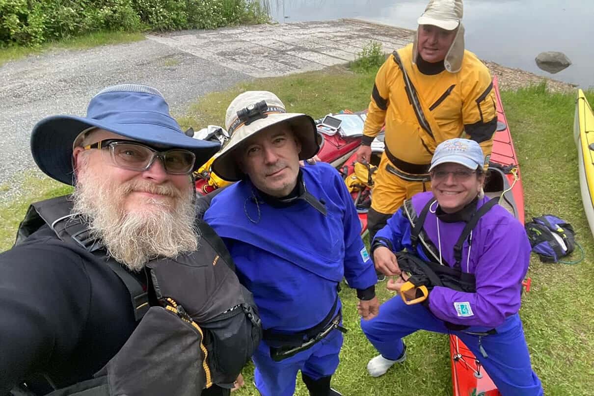 Jeff Johnson poses with fellow paddlers during their Lake Superior trip