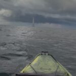 Massive Waterspout Drops Down In Front Of Kayak Fishermen (Video) waterspout over ocean