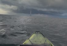 Massive Waterspout Drops Down In Front Of Kayak Fishermen (Video) waterspout over ocean
